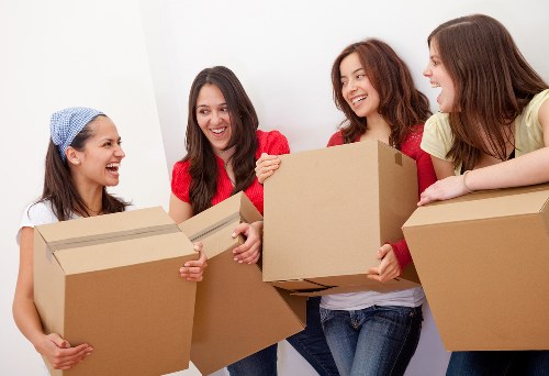 Packed moving boxes and protective materials ready for transport