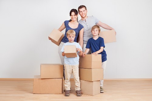 Careful loading of boxes and household items during a Surrey house removal