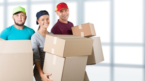 Packing and furniture loading into a removal van