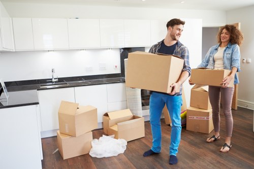 House removalists planning a Surrey home move with boxes and furniture